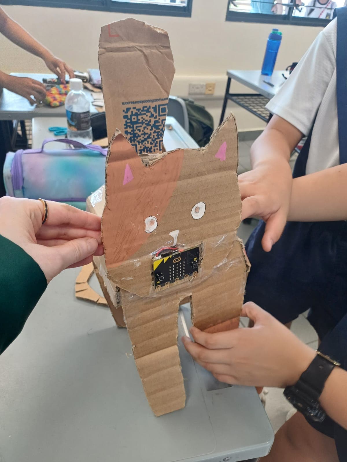 Shake it or leave it alone — this cardboard cat has feelings. A primary school micro:bit virtual pet.